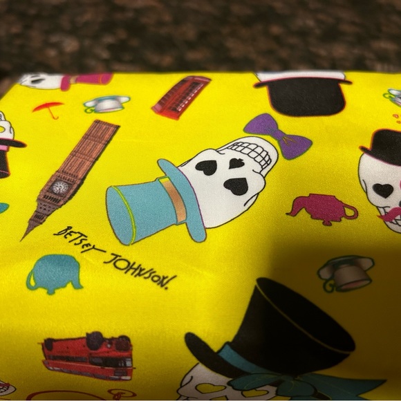 NWOT Betsey Johnson makeup travel bag in vibrant yellow with skull design. - Picture 6 of 10